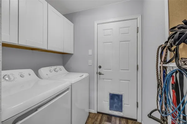 a view of storage and utility room with washer and dryer