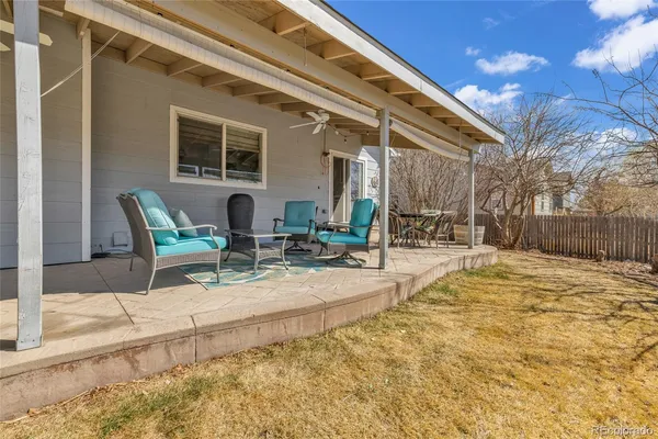 a building outdoor space with patio furniture