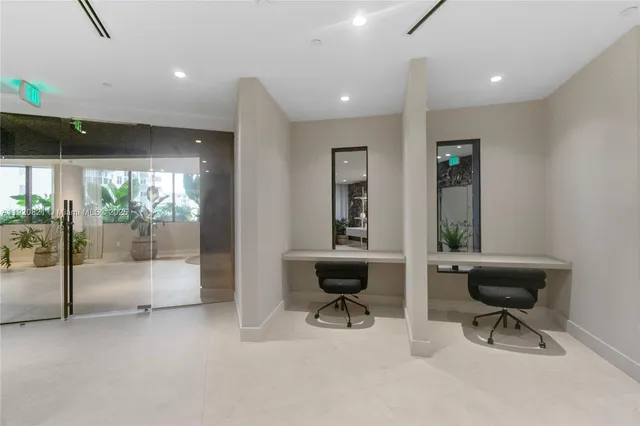 a large room with furniture and a large window