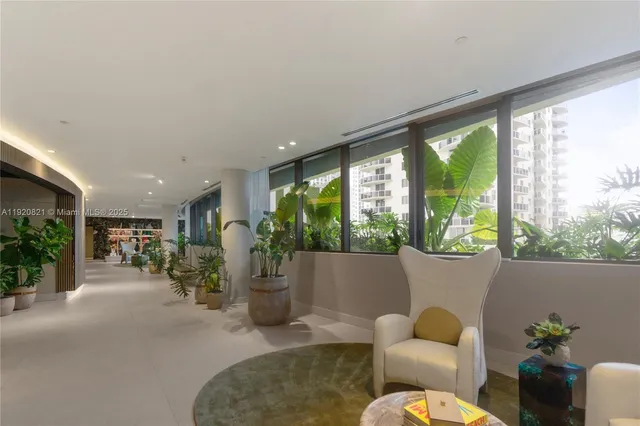 a view of a lake with a table and chairs
