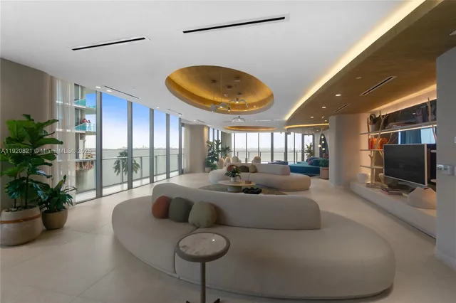 an aerial view of residential house with outdoor space and swimming pool