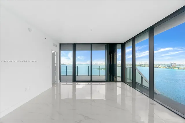 a large white room with a large window