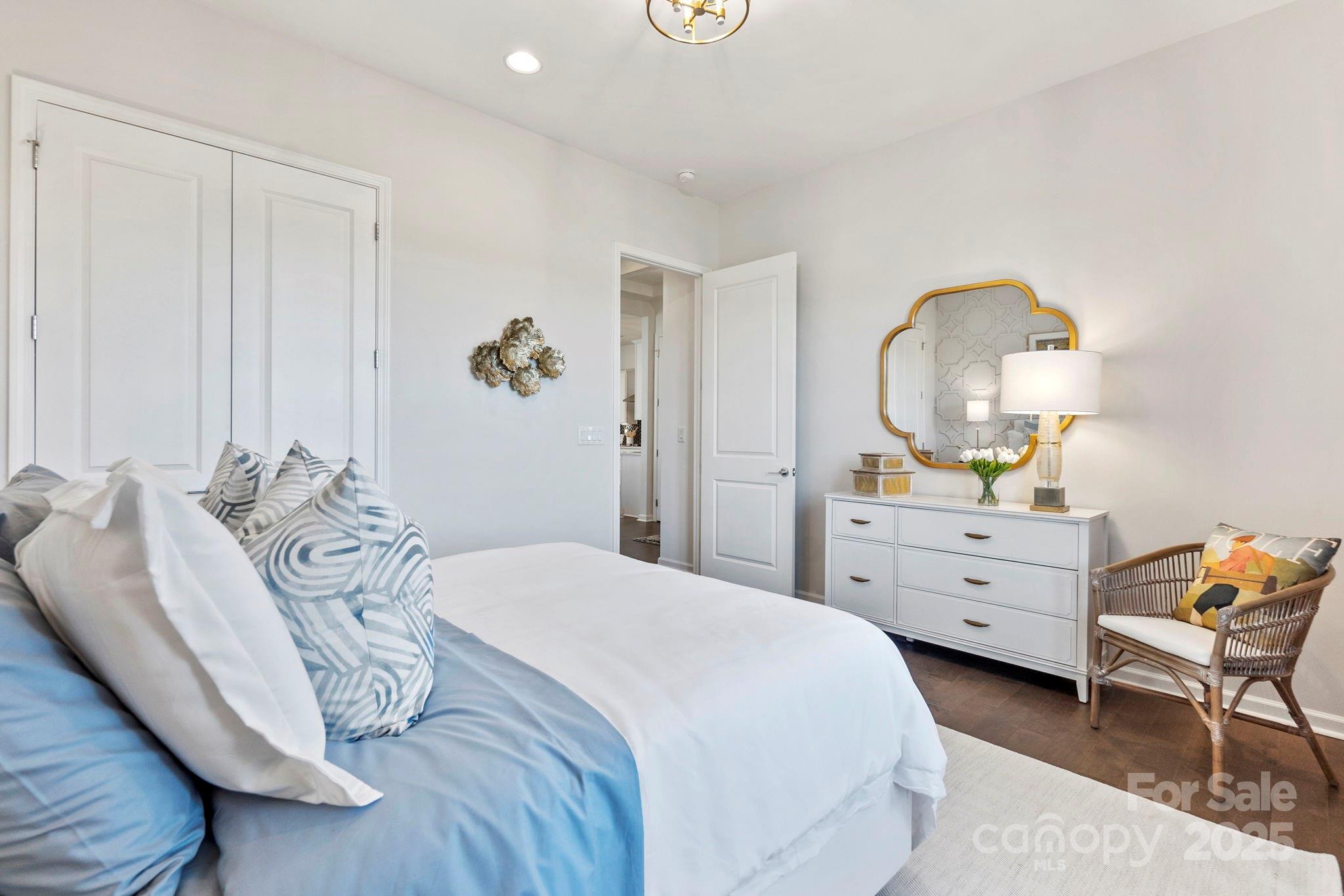 5068 Duval Circle Tega Cay, SC 29708 - Photo 25 of 41 a bedroom with a bed and a dresser