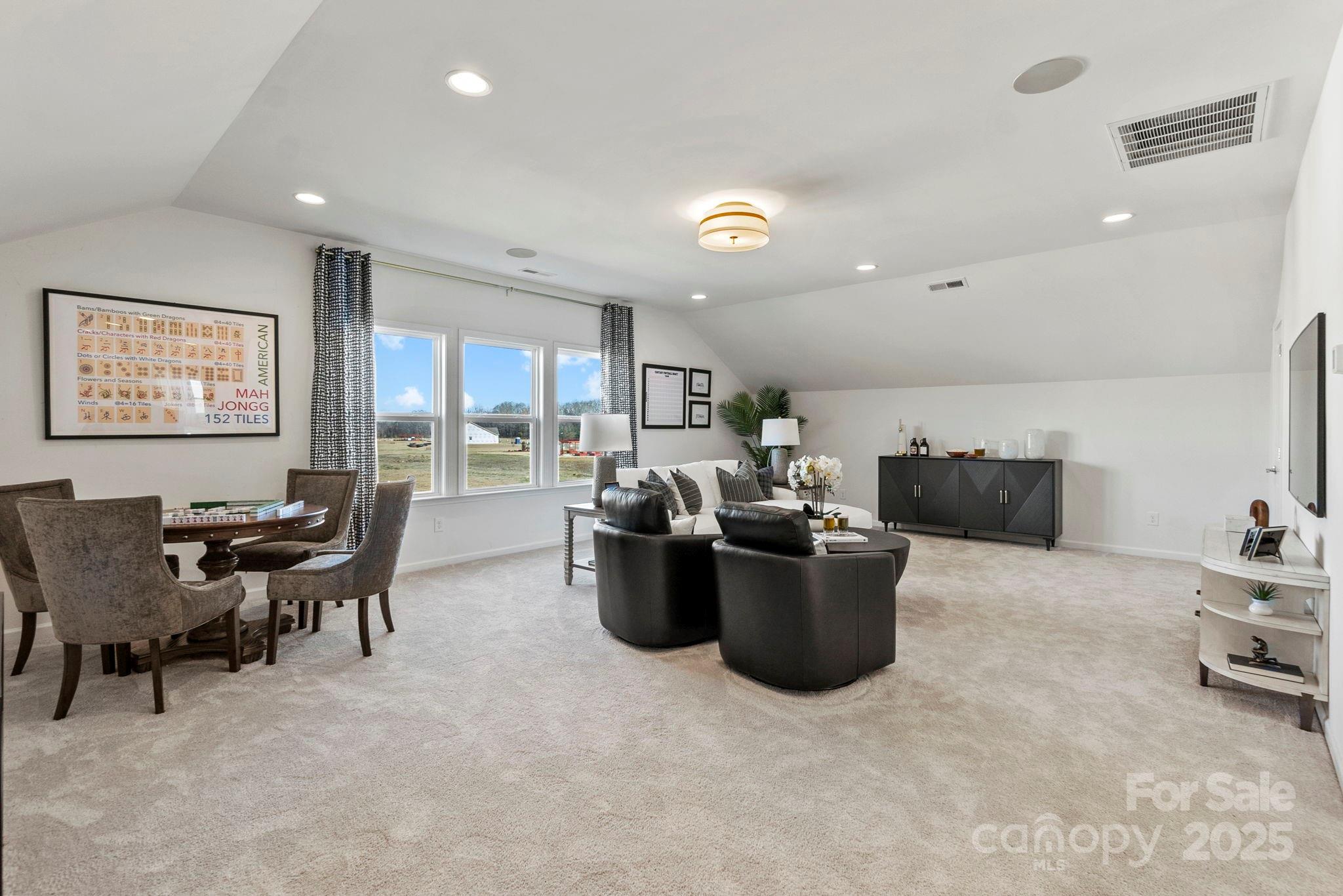 5068 Duval Circle Tega Cay, SC 29708 - Photo 28 of 41 a living room with furniture and a large window