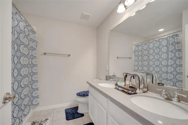 an aerial view of residential building and ocean