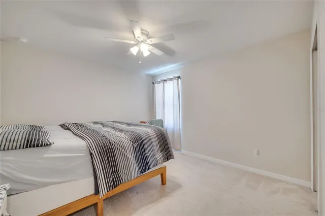 a view of a swimming pool with an outdoor seating