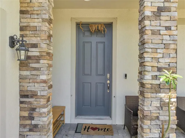 a view of entryway with wooden floor