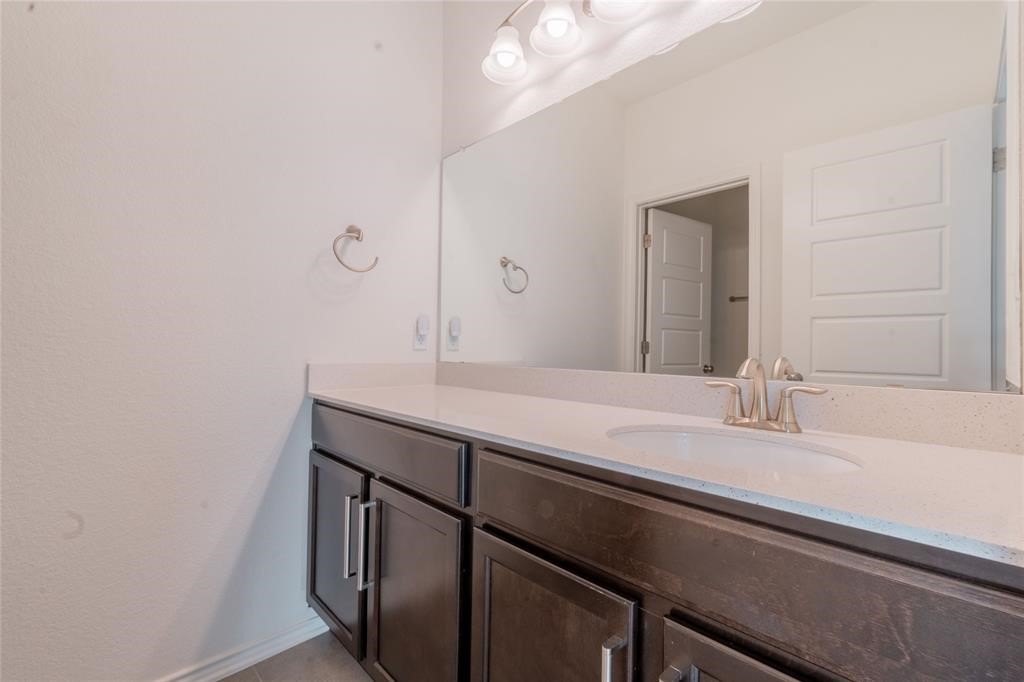 1333 Terrace View Drive Georgetown, TX 78628 - Photo 22 of 35 A well-appointed bathroom vanity with a spacious counter and ample storage.