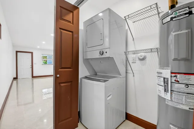 a utility room with washer and dryer