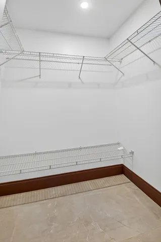 a bathroom with a sink mirror and a shower