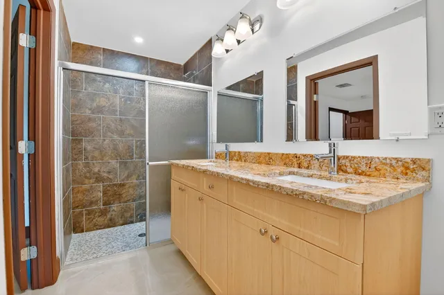 a backyard of a house with wooden floor