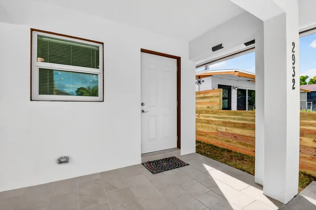 a kitchen with stainless steel appliances kitchen island a refrigerator and a sink
