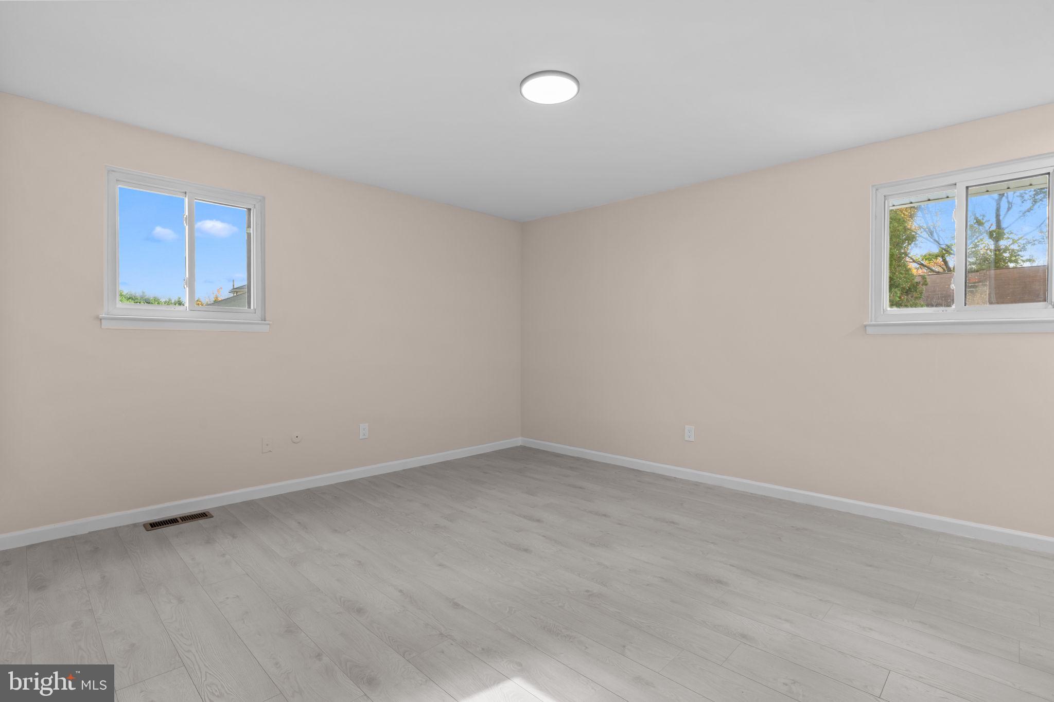 100 East Endfield Road Feasterville-Trevose, PA 19053 - Photo 22 of 53 a view of an empty room with a window