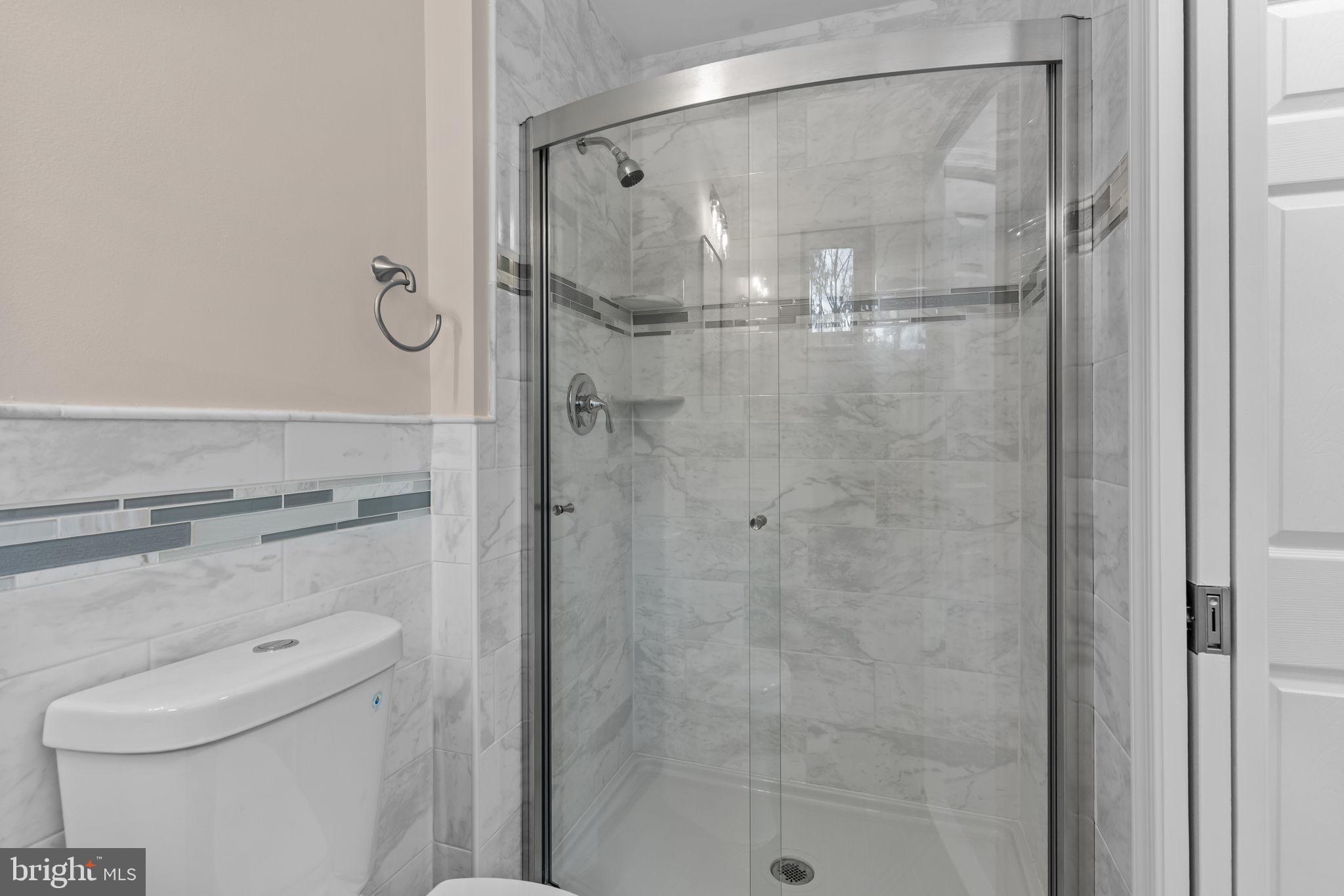 100 East Endfield Road Feasterville-Trevose, PA 19053 - Photo 25 of 53 a bathroom with a shower and toilet