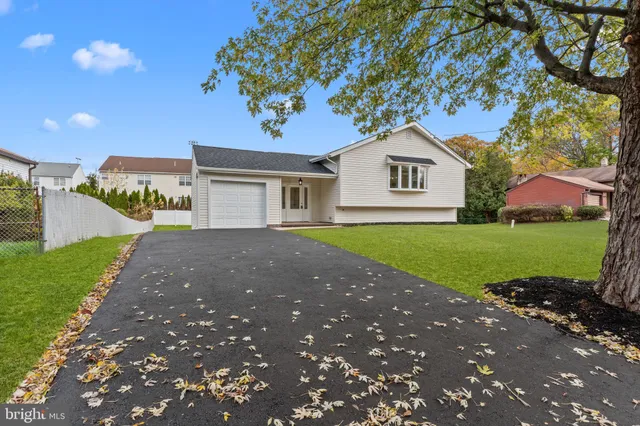 a house view with a garden space