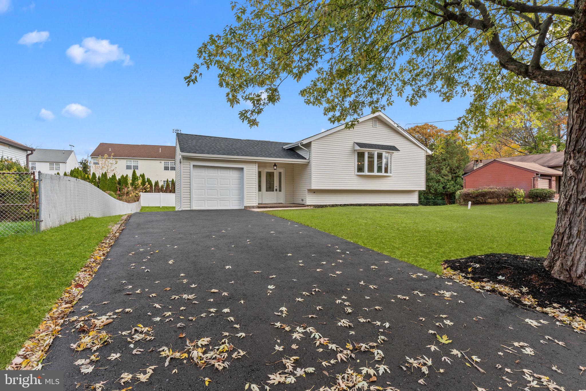100 East Endfield Road Feasterville-Trevose, PA 19053 - Photo 3 of 53 a house view with a garden space