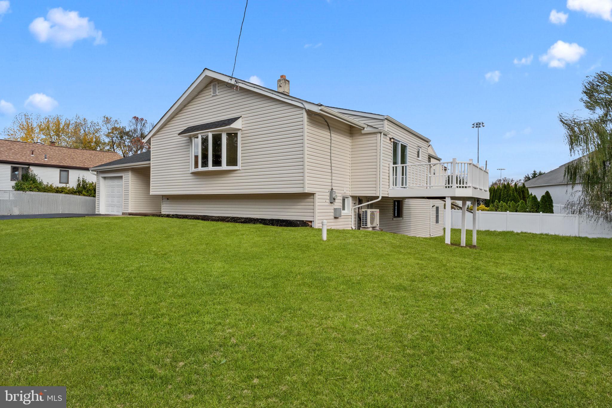 100 East Endfield Road Feasterville-Trevose, PA 19053 - Photo 37 of 53 a view of a house with a yard