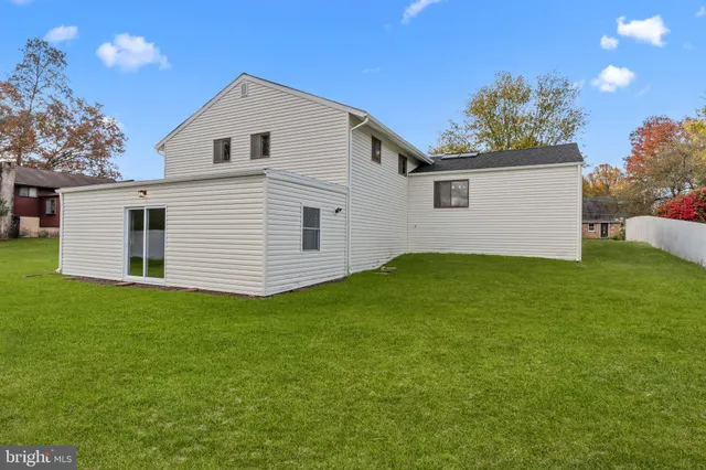 an aerial view of a house with a garden