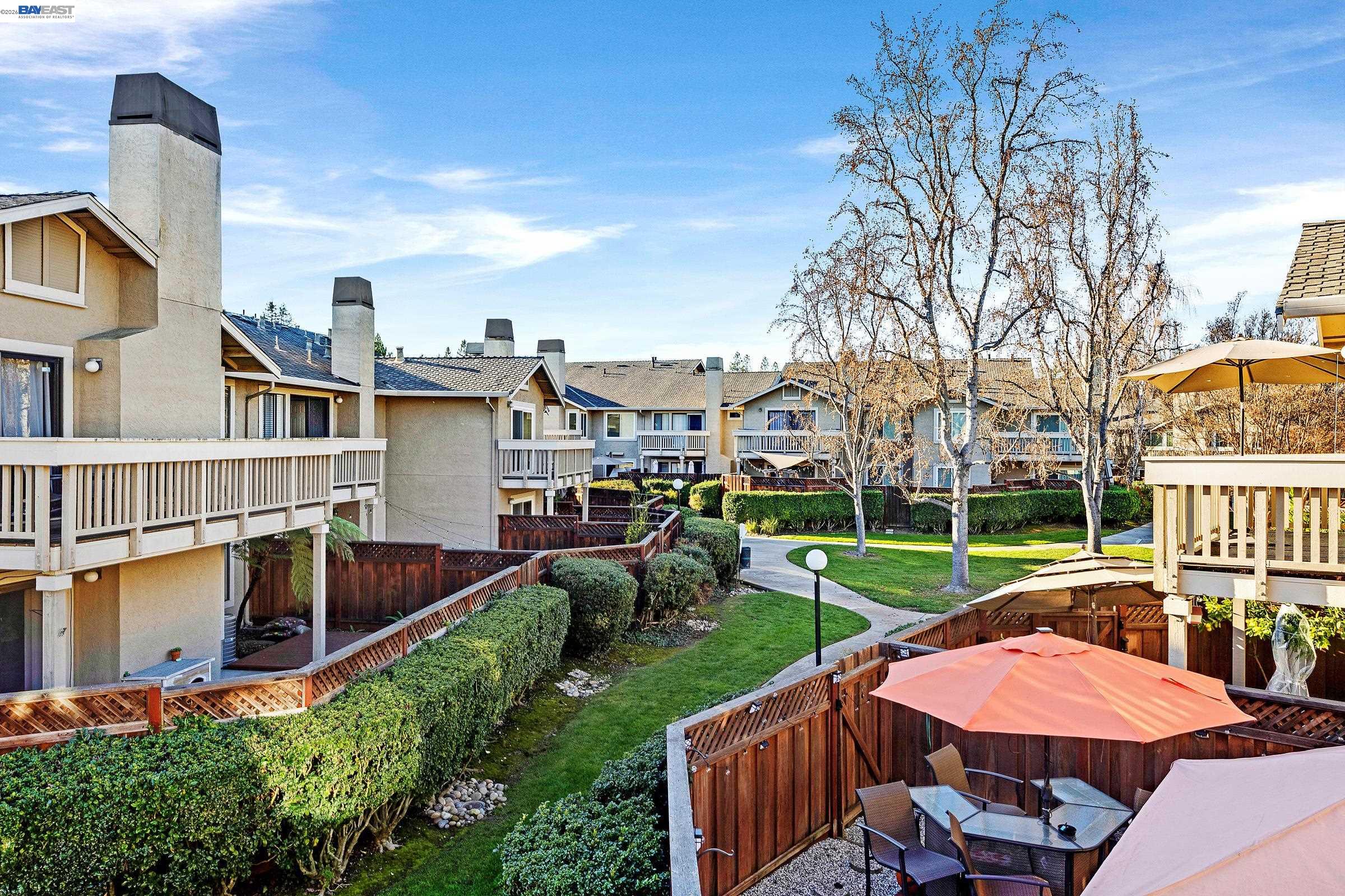 3769 Crow Canyon Road San Ramon, CA 94582 - Photo 51 of 56 a view of a house with a yard and furniture