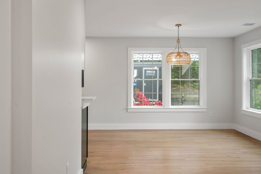 19 Whitehorse Road Hingham, MA 02043 - Photo 11 of 35 a view of an empty room with a window