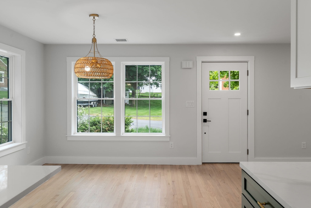 19 Whitehorse Road Hingham, MA 02043 - Photo 17 of 35 a view of room with window and hardwood floor