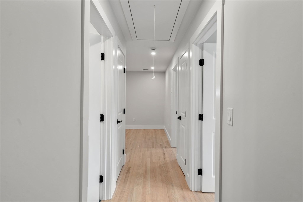19 Whitehorse Road Hingham, MA 02043 - Photo 24 of 35 a view of a hallway with wooden floor