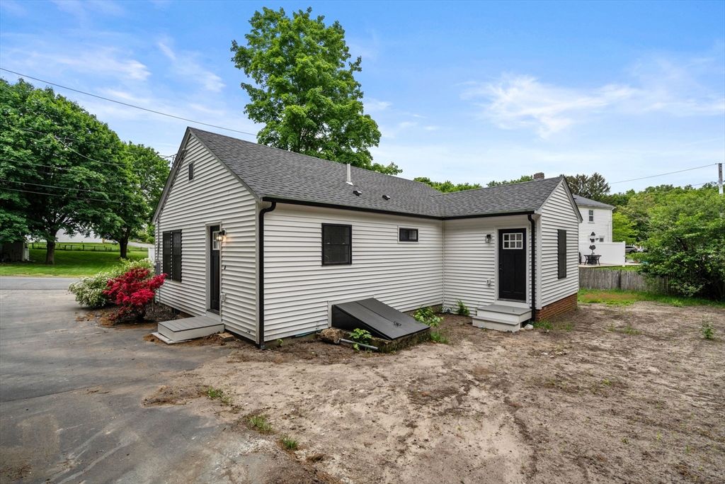 19 Whitehorse Road Hingham, MA 02043 - Photo 27 of 35 a view of a house with a yard and a large tree