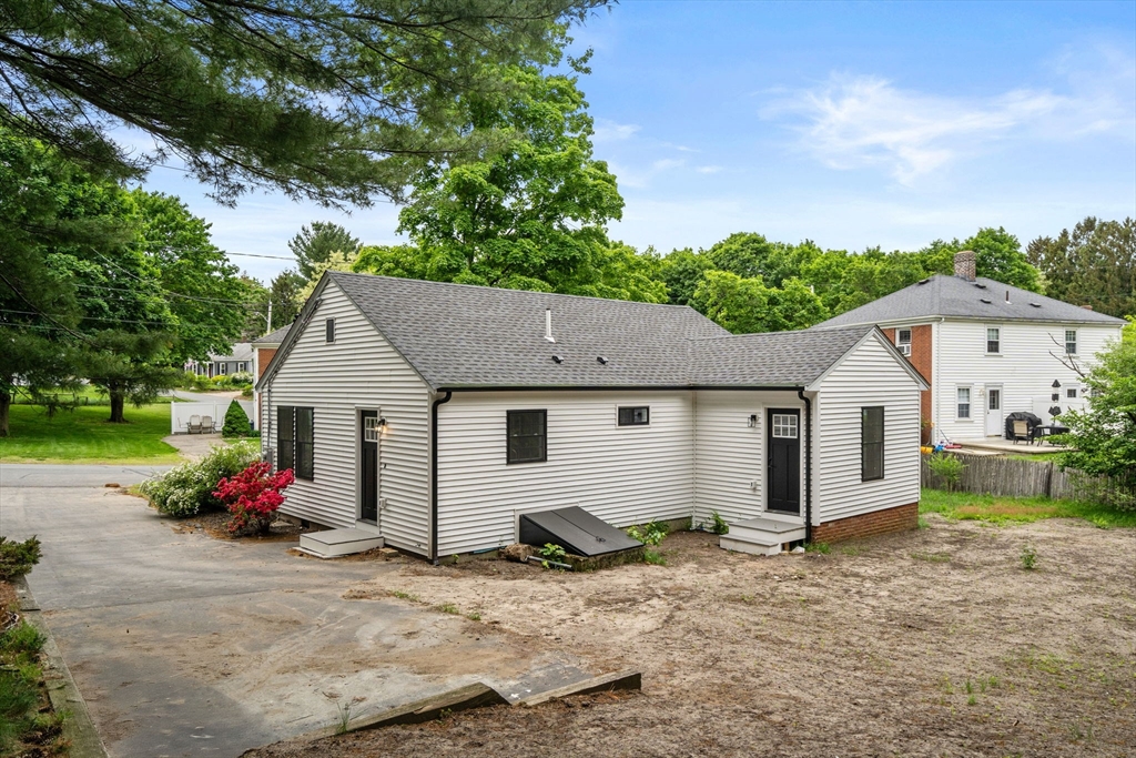 19 Whitehorse Road Hingham, MA 02043 - Photo 33 of 35 front view of house with a yard