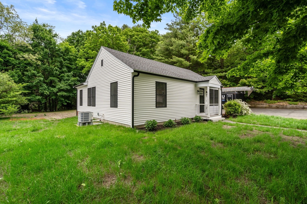 19 Whitehorse Road Hingham, MA 02043 - Photo 34 of 35 a view of a house with backyard
