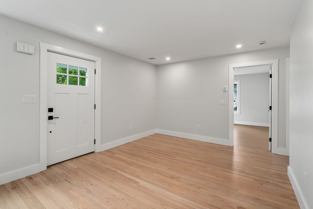19 Whitehorse Road Hingham, MA 02043 - Photo 8 of 35 wooden floor in an empty room