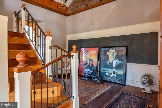 a view of an entryway with wooden floor