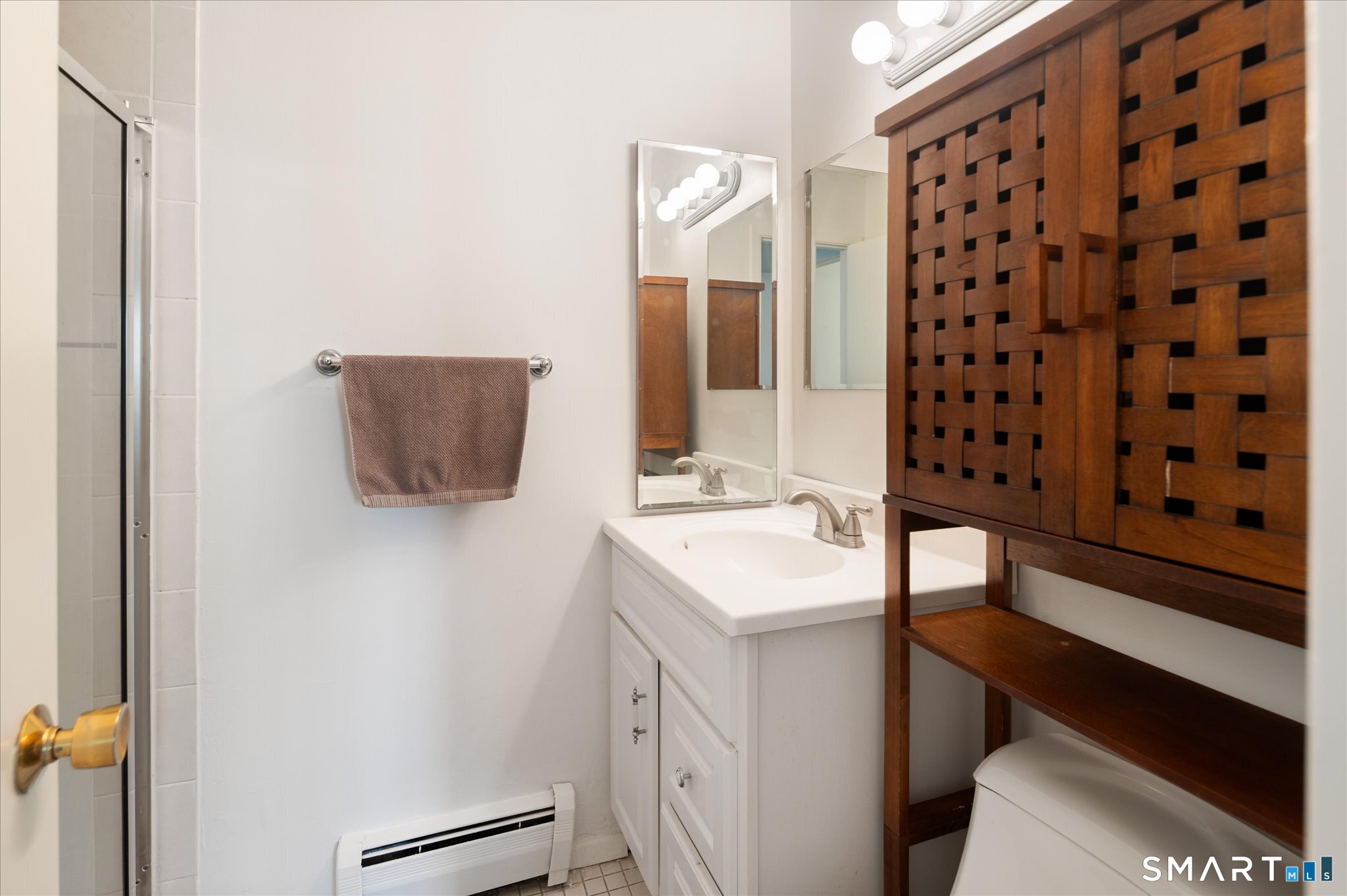 154 Cold Spring Road, Unit 23 Stamford, CT 06905 - Photo 16 of 34 The primary bath offers privacy and convenience