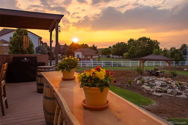 a view of a swimming pool with a lounge chair