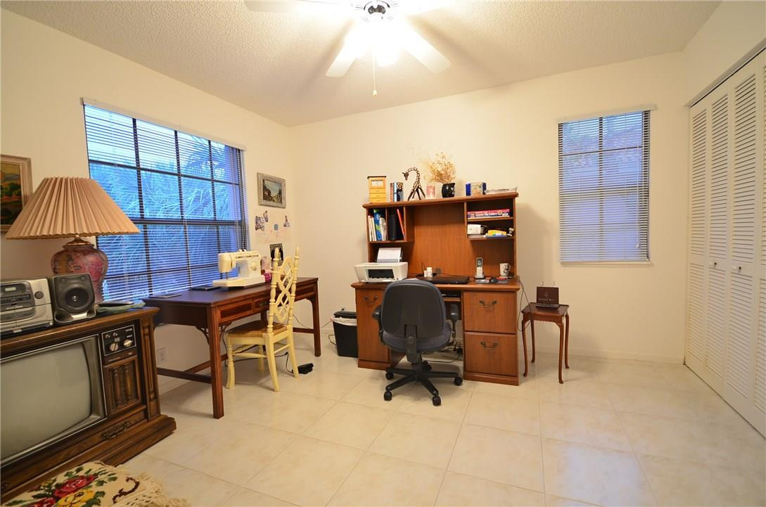 6761 Montego Bay Boulevard, Unit B Boca Raton, FL 33433 - Photo 8 of 34 a view of a workspace with furniture