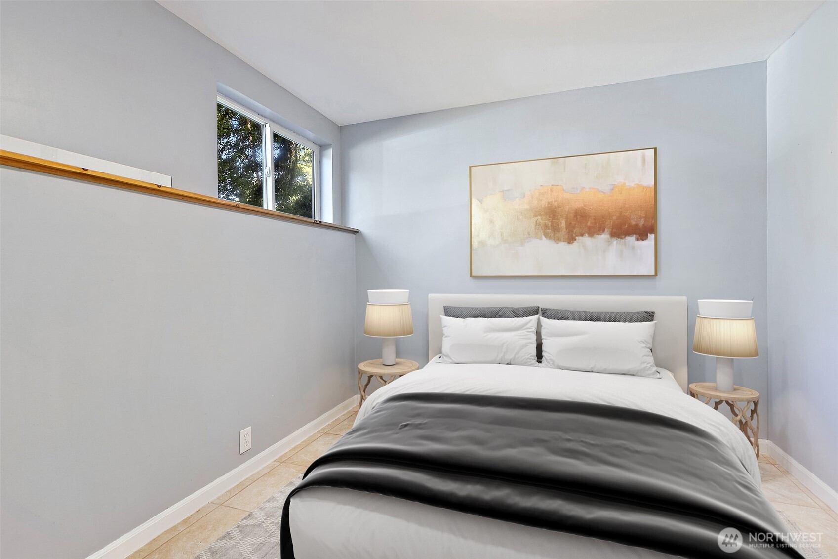 9880 Fredrickson Road Northwest Bremerton, WA 98311 - Photo 24 of 28 a bedroom with a bed and lamp