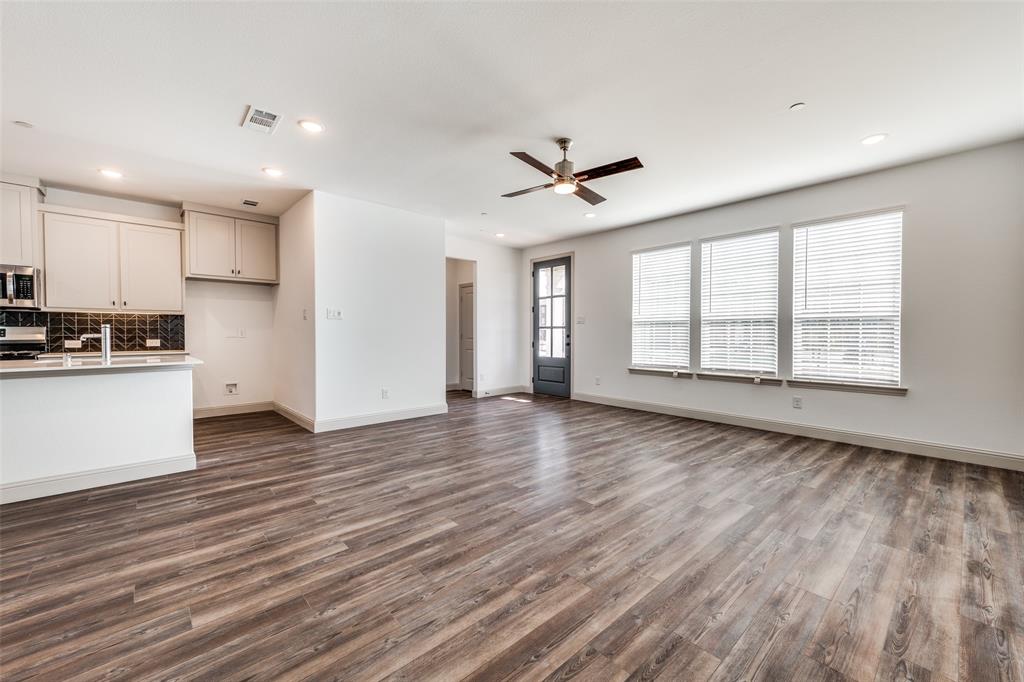 15866 Yellow Elder Road Frisco, TX 75035 - Photo 4 of 25 a view of an empty room with window and wooden floor