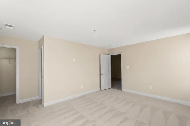 a bathroom with a sink toilet a mirror and shower