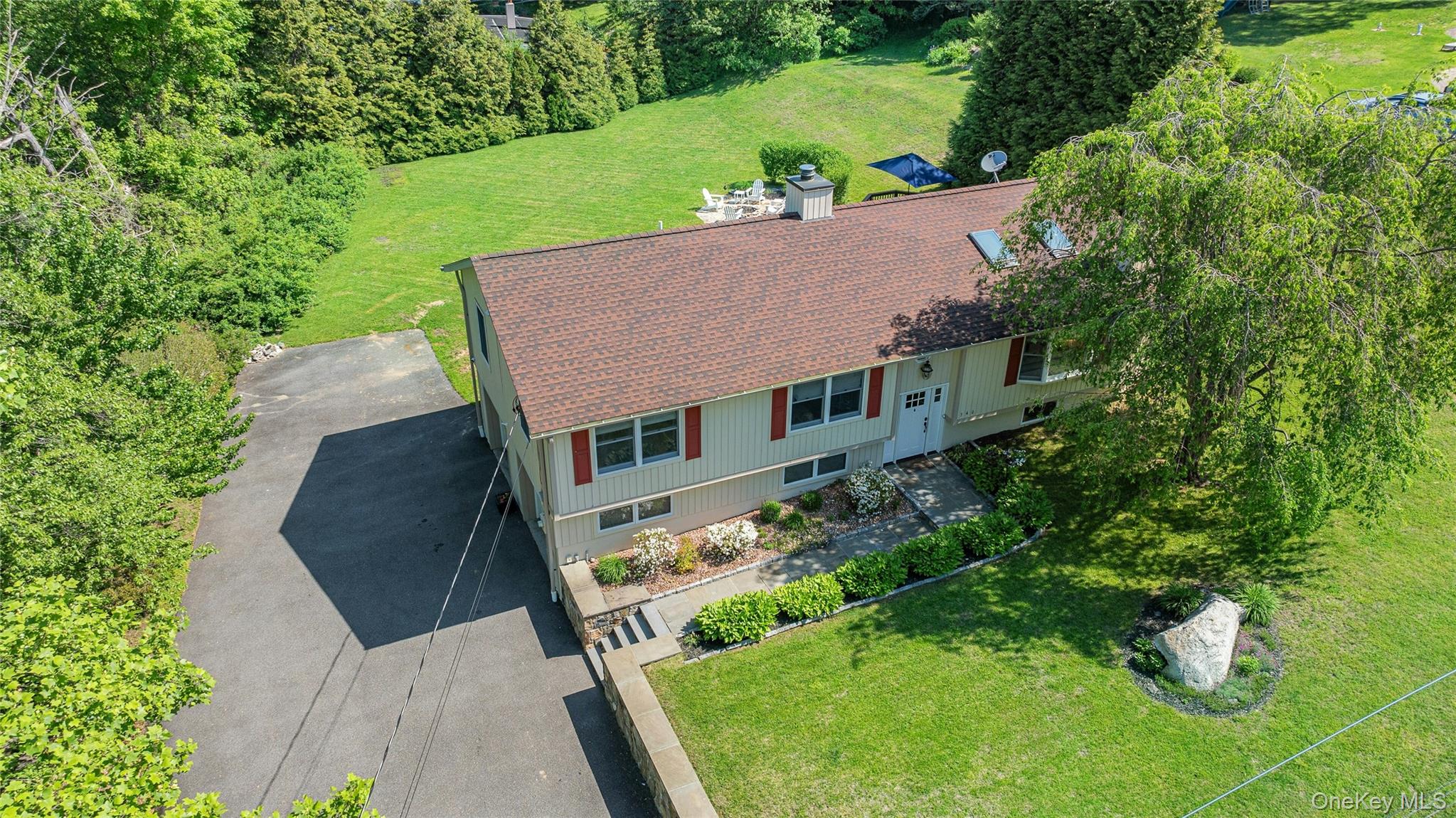340 Osceola Road Jefferson Valley, NY 10535 - Photo 38 of 48 an aerial view of a house