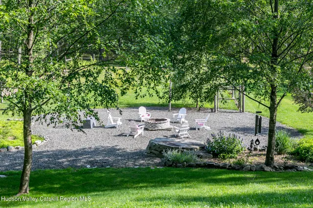 a view of a yard with a tree