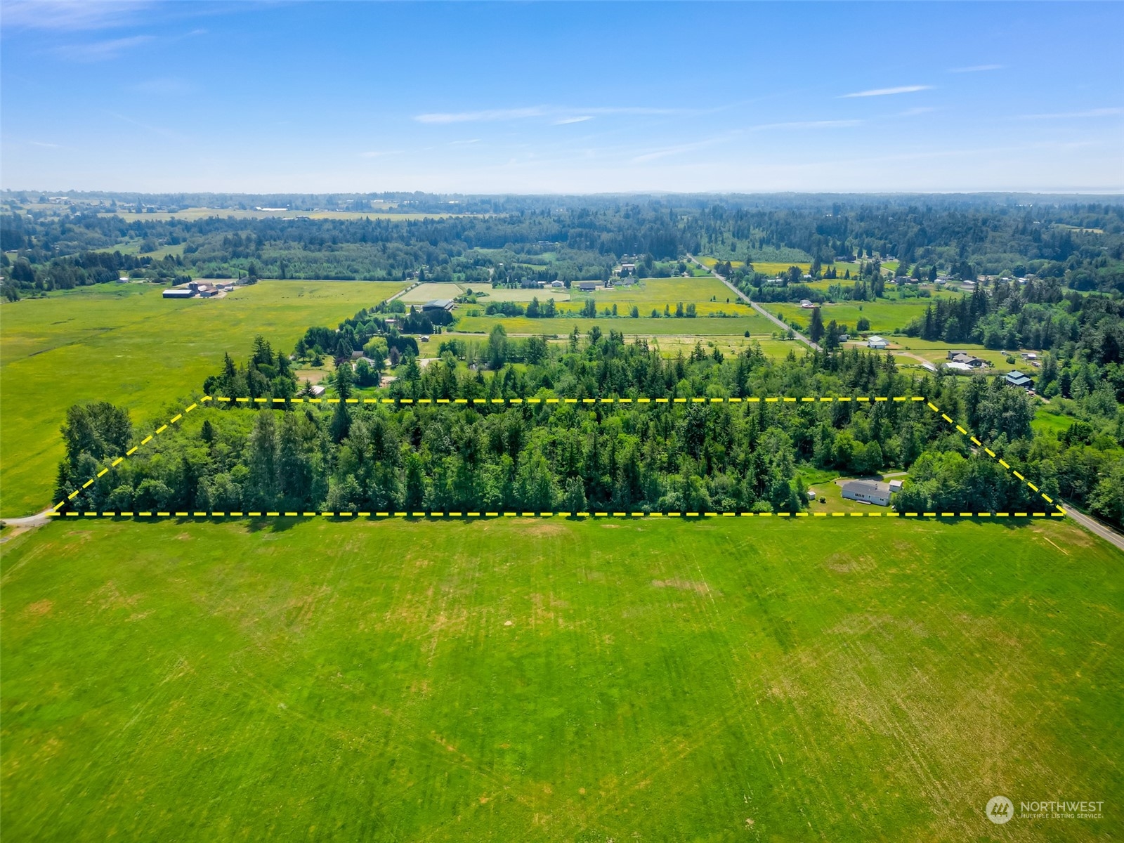 7488 Ham Road Ferndale, WA 98248 - Photo 35 of 36 a view of a garden with an ocean