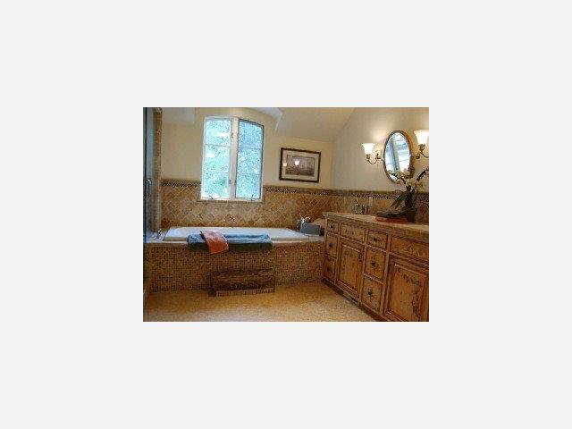 3590 Tripp Road Woodside, CA 94062 - Photo 7 of 9 a bathroom with a sink a mirror and a bathtub