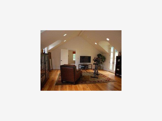 3590 Tripp Road Woodside, CA 94062 - Photo 8 of 9 a living room with furniture and a mirror