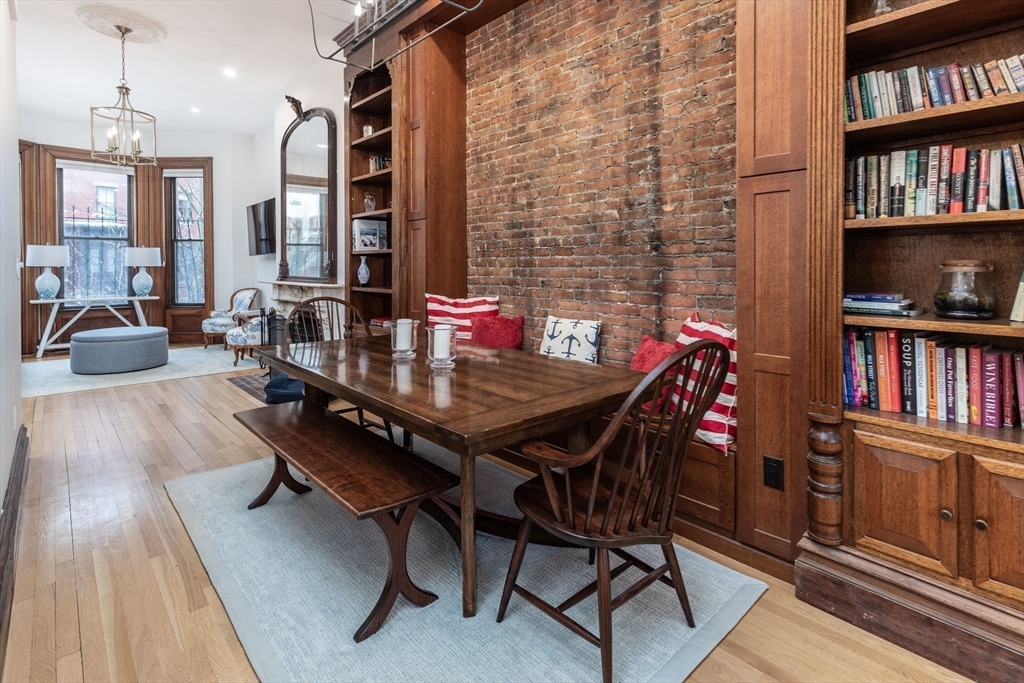 23 Braddock Park, Unit 2 Boston, MA 02116 - Photo 6 of 22 a outdoor dining space with furniture and a book shelf