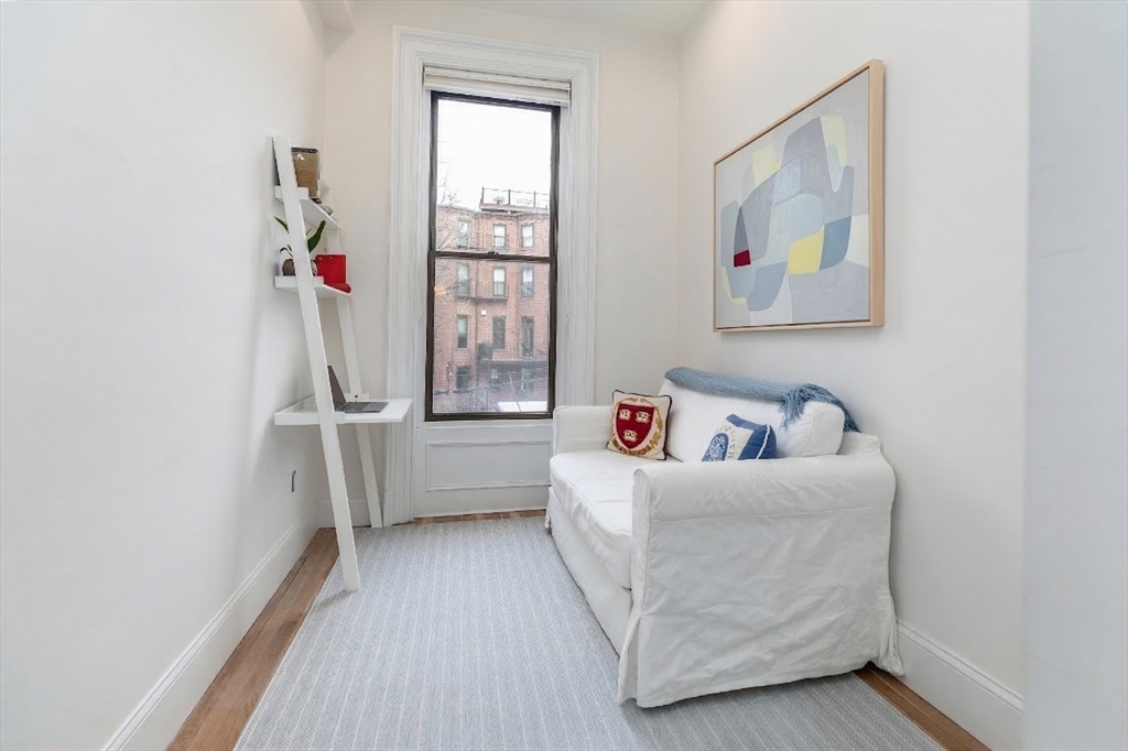 23 Braddock Park, Unit 2 Boston, MA 02116 - Photo 7 of 22 a living room with furniture and a window