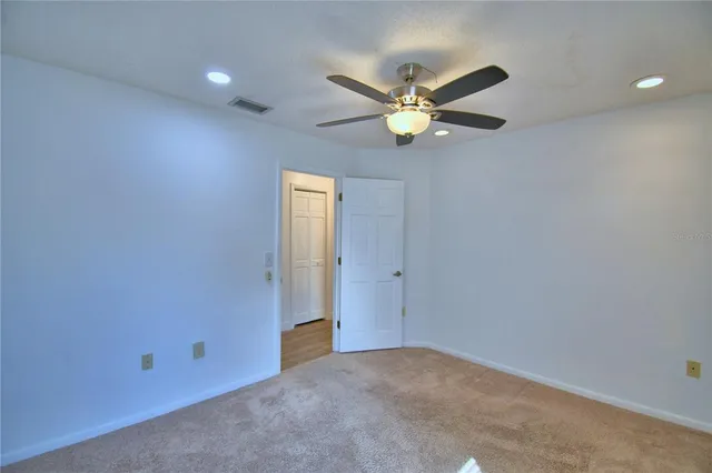 a view of a lake with a yard