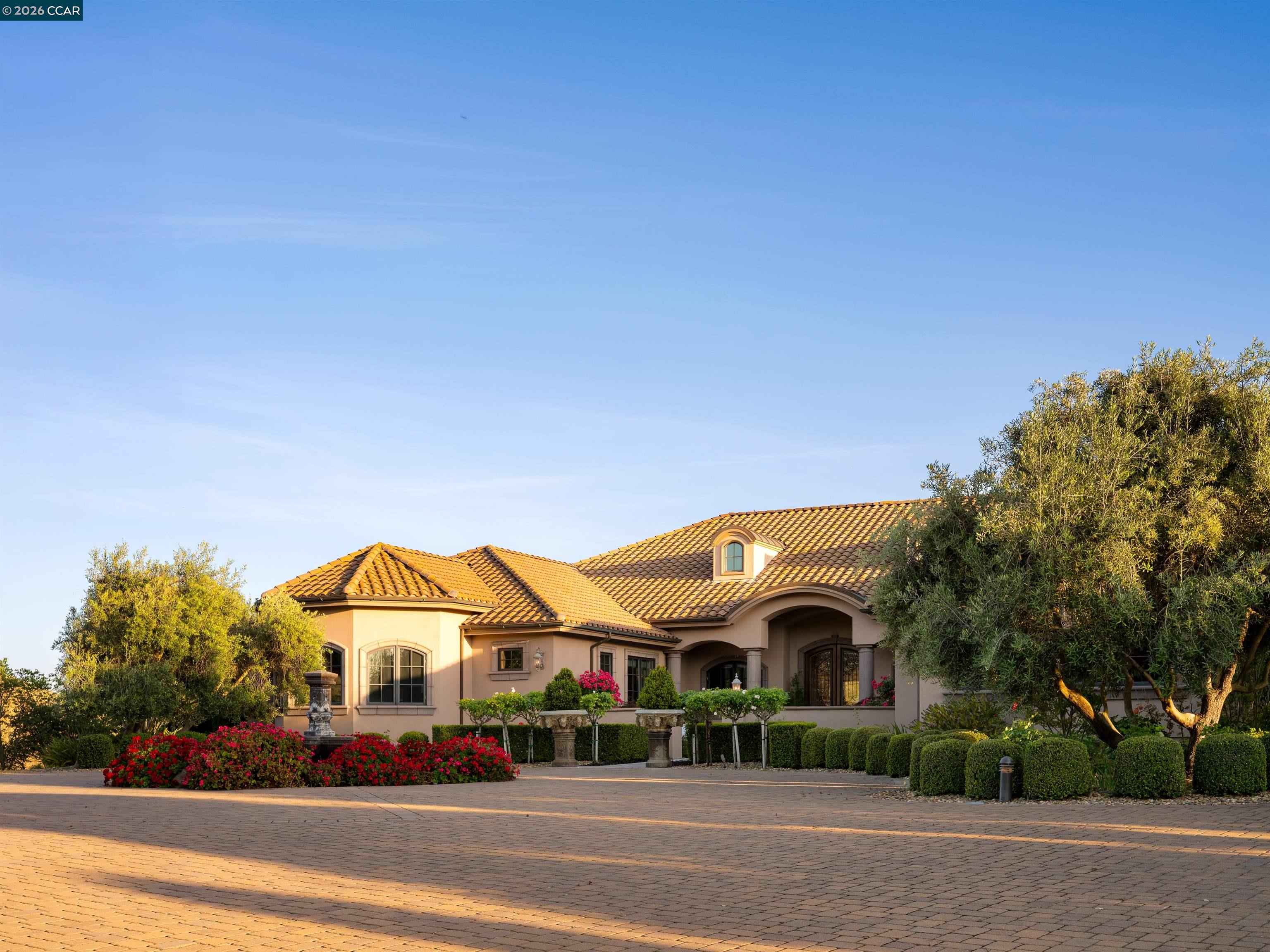 2020 Victorine Road Livermore, CA 94551 - Photo 71 of 99 a view of a big and white house with a big yard and large trees