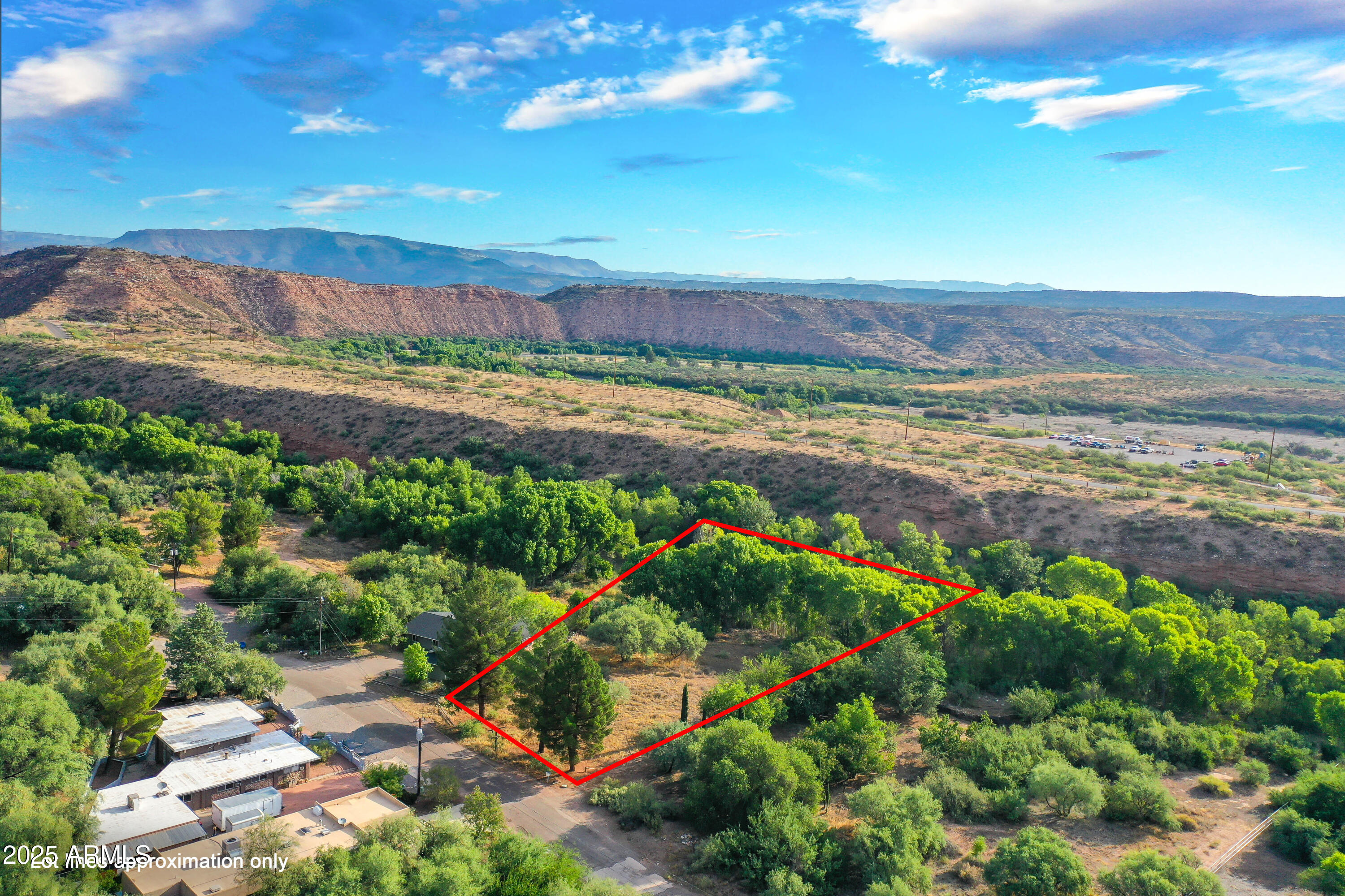125 Rincon Drive Clarkdale, AZ 86324 - Photo 6 of 6 a view of a lake with a mountain