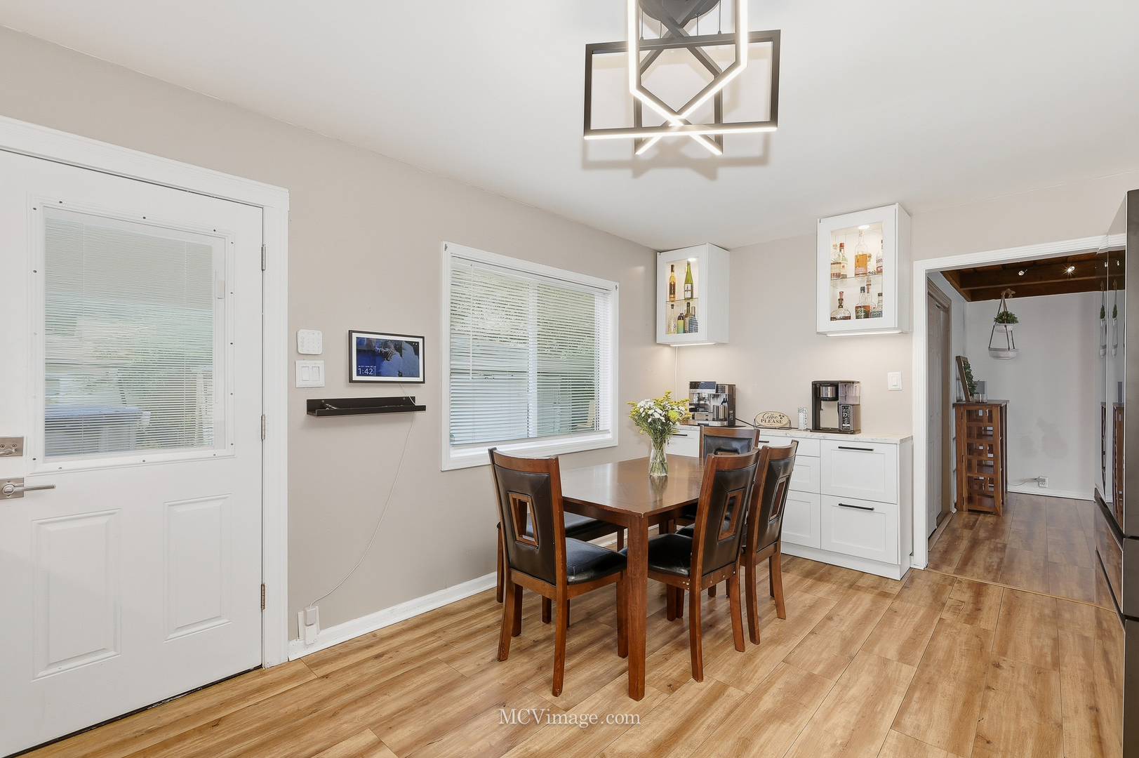 242 Tallman Avenue Romeoville, IL 60446 - Photo 17 of 25 a view of a dining room with furniture and wooden floor