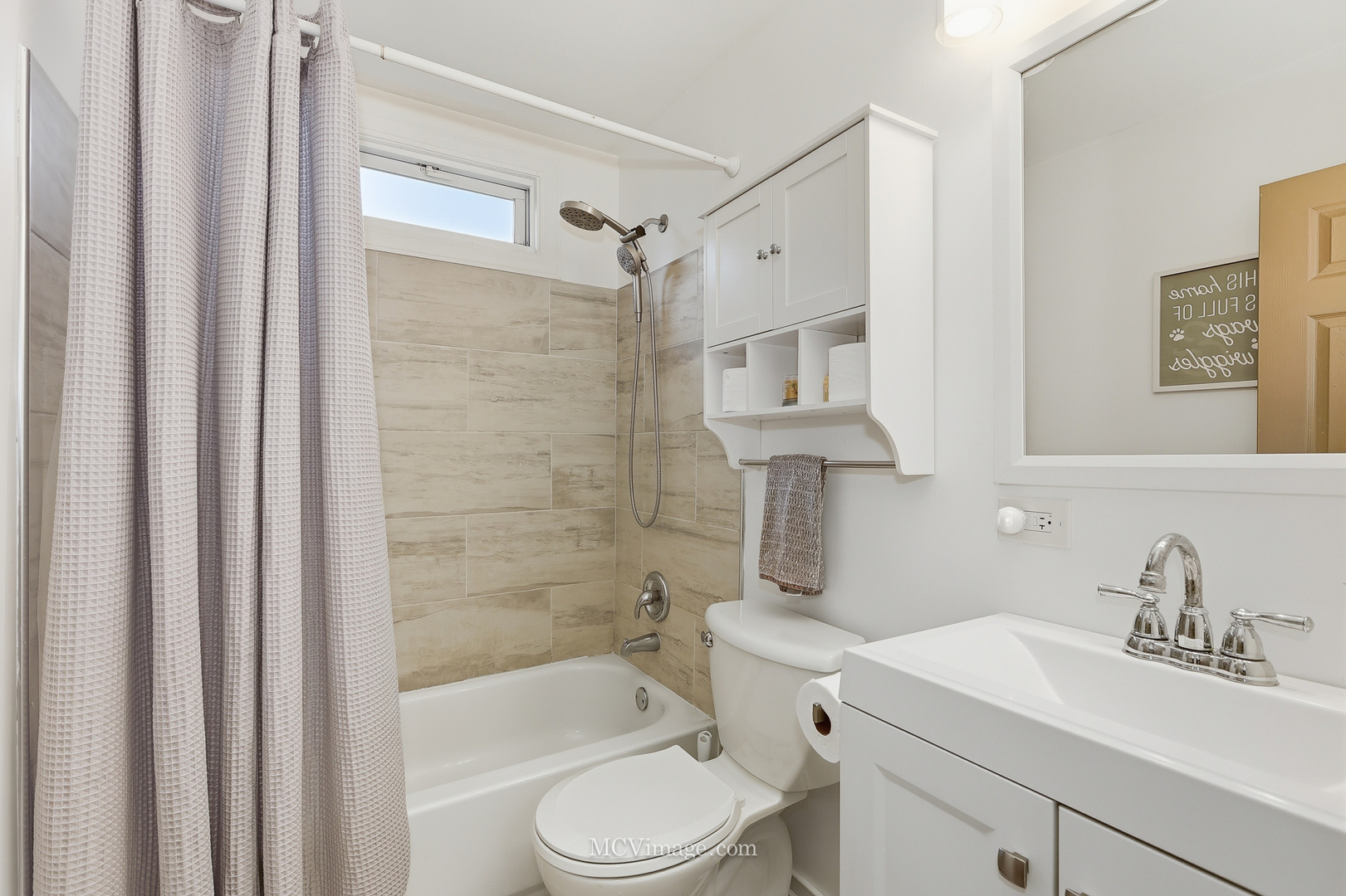 242 Tallman Avenue Romeoville, IL 60446 - Photo 18 of 25 a bathroom with a sink toilet and shower