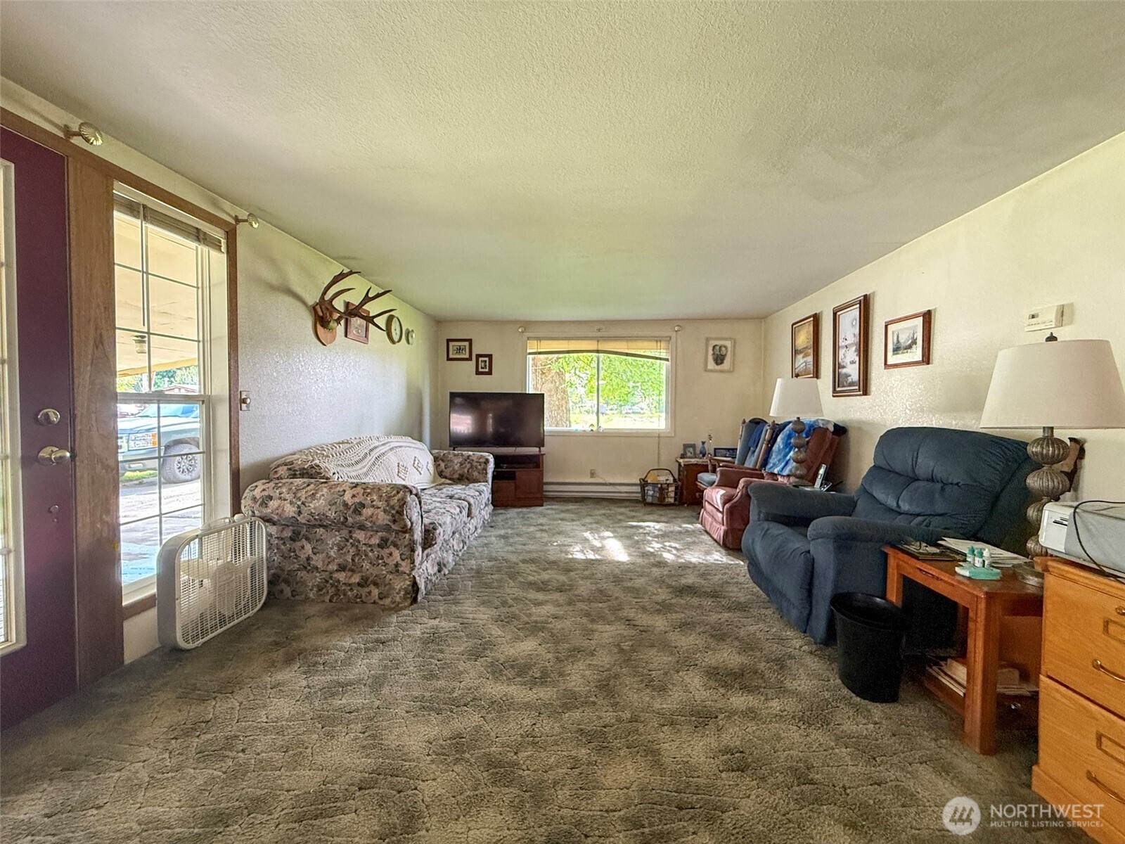 518 Bridge Street Twisp, WA 98856 - Photo 9 of 40 a living room with furniture and a window